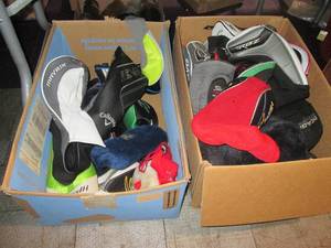 lot 280 image: (2) boxes of assorted golf club cov...