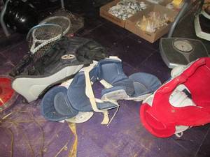 lot 334 image: Football shoulder pads, baseball he...