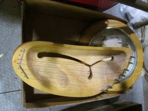 lot 398 image: Wooden clock and wooden lap harp...