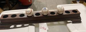 lot 014 image: Baseballs in a display case