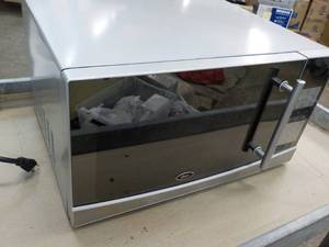 lot 59 image: Oster Microwave...