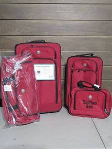 lot 46 image: Travelers Club 4-Piece Travel Luggage Set - Red