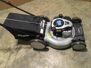 lot 14 image: Murray  21 in. 140 cc Briggs and Stratton Walk Behind Gas Push Lawn Mower with Height Adjustment and with Mulch Bag Customer Returns See Pictures