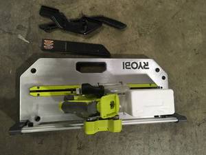 lot 35 image: RYOBI ONE 18V 5-12 in. Flooring Saw with Blade (Tool Only)  Customer Returns See Pictures