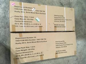 lot 41 image: 2 Lots of Husky 48 in. Solid Wood Work Surface for Regular Duty Welded Steel Garage Storage System Customer Returns See Pictures