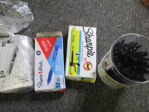 lot of pens and sharpies...