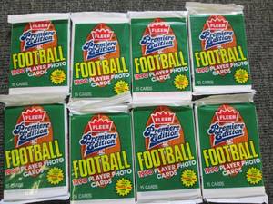 8 packages of fleer 1990 football c...