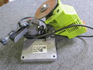 chainsaw sharpener turns on ...