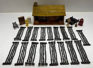 lot 144 image: 1950s Marx Bar M Ranch  Tin Litho Log Cabin And Accessories