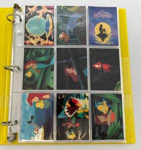 lot 148 image: 1991 Disneys The Little Mermaid Trading Cards In Album  (Roughly 124 Total)