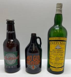 lot 8 image: Three Large Liquor Advertisement Bottles Including Cutty Shark And More