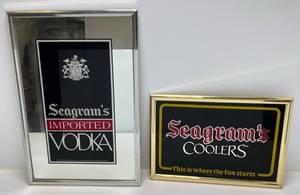 lot 15 image: Two Vintage Framed Seagrams Mirrors 1 13 12 x 19 12 1 17 14 x 25 14