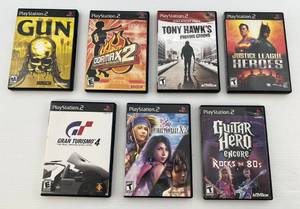 lot 40 image: 7 Vintage Playstation 2 Games Including  Justice League Heros And More