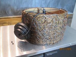 Rattan Basket style ceiling mount hanging lamp.