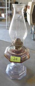 lot 24 image: Old oil lamp, no cracks or chips noted