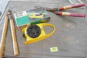 lot 34 image: lawn sprinkler and shears