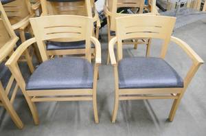 lot 57 image: 6 nice wood chairs with vinyl seat for easy cleaning. Match the tables.