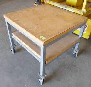 lot 133 image: Nice rolling table 30 inch square x 25 inch tall