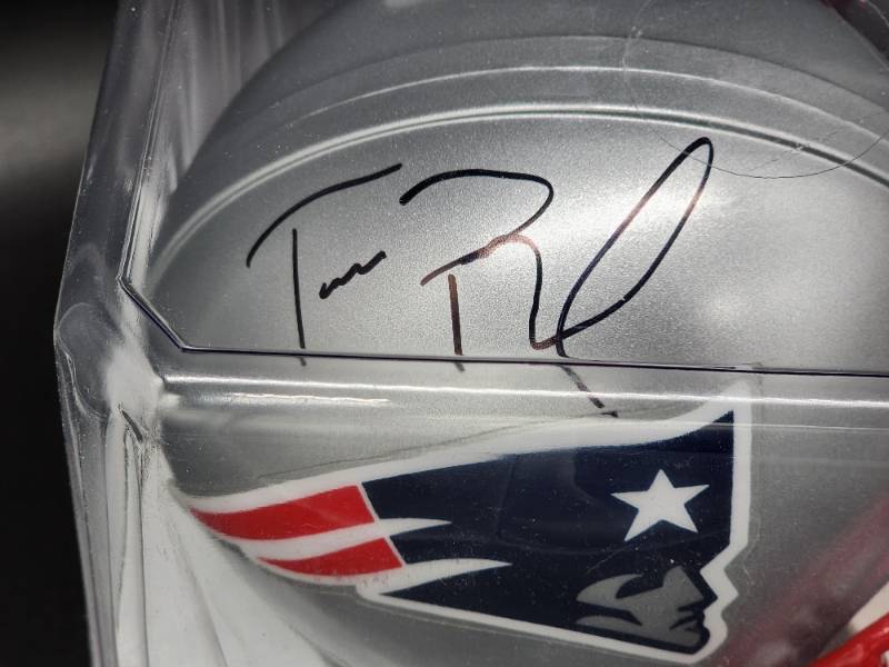 lot 2 image: Autographed Riddell Mini Helmet by New England Patriots The Goat Tom Brady No COA
