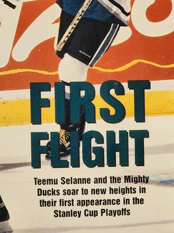 lot 38 image: Poster Board of a Blown-Up Cover of First Flight Magazine of the Anaheim Mighty Ducks