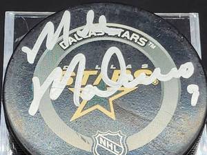 lot 117 image: NHL Minnesota North Stars  Dallas Stars Hockey Great Mike Modano Autographed Hockey Puck No COA