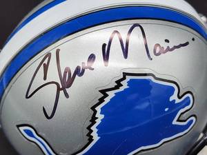 lot 113 image: Riddell Mini Helmet Signed by American Sportscaster and former NFL Head Coach Steve Mariucci Player No COA