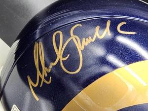 lot 188 image: Autographed Riddell Mini Helmet by St. Louis Rams Marshall Faulk No COA