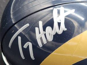 lot 111 image: Riddell Mini Helmet Signed by St Louis Rams WR Torry Holt with COA