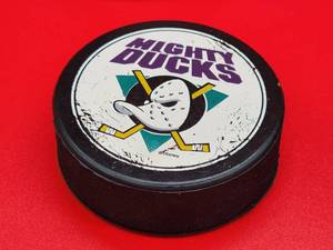 lot 175 image: (9) Assorted Commemorative Hockey Pucks