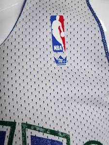 lot 142 image: Minnesota Timberwolves Early Years Jersey