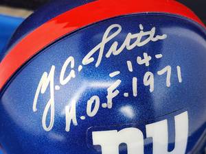 lot 185 image: Autographed Riddell Mini Helmet by New Giants HOFer Y.A. Tittle with LOA