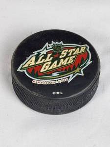 lot 290 image: Original Hard Hat Required During the Construction of the Xcel Energy Center Plus (3) Minnesota Wild Hockey Pucks