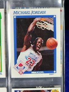lot 287 image: Assorted Sports Cards in Black Binder Collection