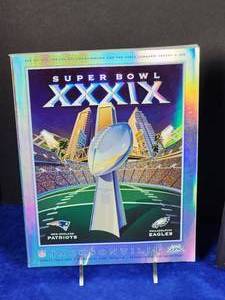 lot 302 image: (2) Official NFL Super Bowl Game Program