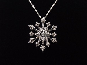 lot 26 image: .925 Sterling Silver Diamond Accented Snowflake Pendant Necklace