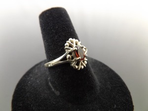lot 49 image: .925 Sterling Silver Oval Cut Garnet Ring Size 8