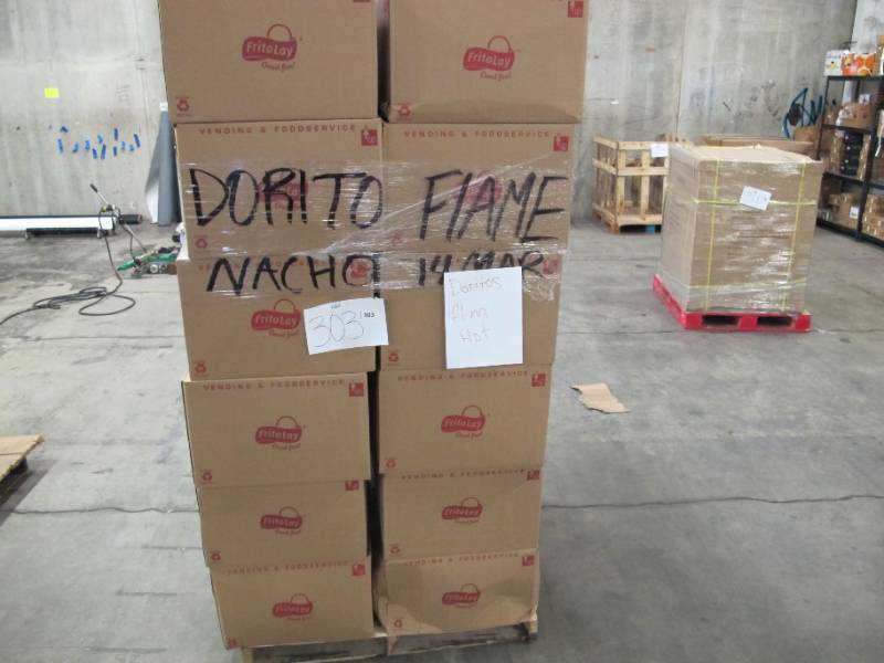 lot 421 image: Pallet of NEW 64 Case Packs of Doritos Flamin Hot Nacho Cheese Chips - 1.75 Oz per bag - 36 CASES