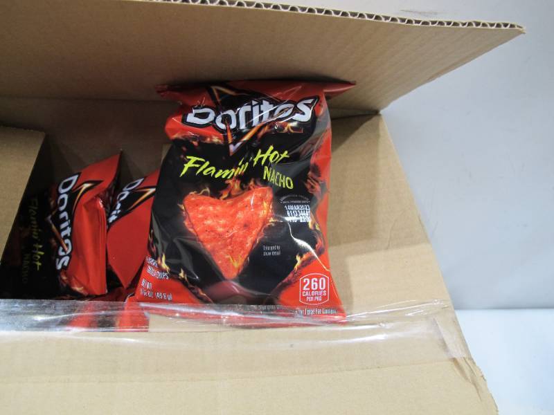 lot 563 image: NEW Case Pack of 64 bags of Doritos Flamin Hot Nacho Cheese Chips - 1.75 Oz per bag