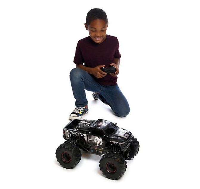 lot 570 image: New Bright 110 Scale Radio Control Raminator Monster Truck - Black