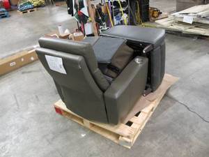lot 428 image: Pallet of 2 Different Faux Leather Chairs - Missing Leg and Scratched