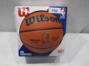 lot 702 image: NEW Wilson NBA Signature Series IndoorOutdoor Basketball - Size 7 Mens