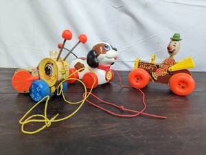 lot 37 image: Three Vintage Fisher-Price Pull-Along Toys