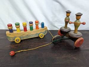 lot 38 image: Two Vintage Wooden Pull-Along Toys
