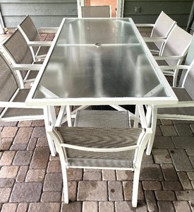 lot 21 image: Awesome Metal Glass Top Patio Table with 8 Chairs and Umbrella