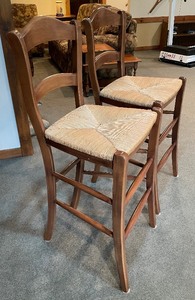 lot 25 image: Pair of Wooden Barstools with Caned Seats