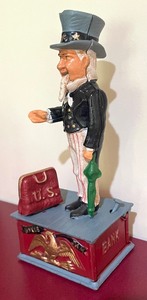 lot 62 image: Uncle Sam Cast Iron Coin Bank