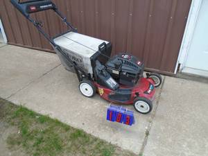 Toro personal pace mower with bagger. Used condition. Tested & works. As shown.
