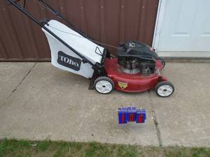 Toro recycler self propelled mower with bagger. Used condition. Tested & works. As shown.