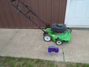 Lawn Boy push mower. Used condition. Tested & works. As shown.