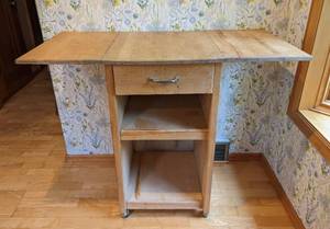 lot 60 image: Crate and Barrel Expandable Rolling Butcher Block Table